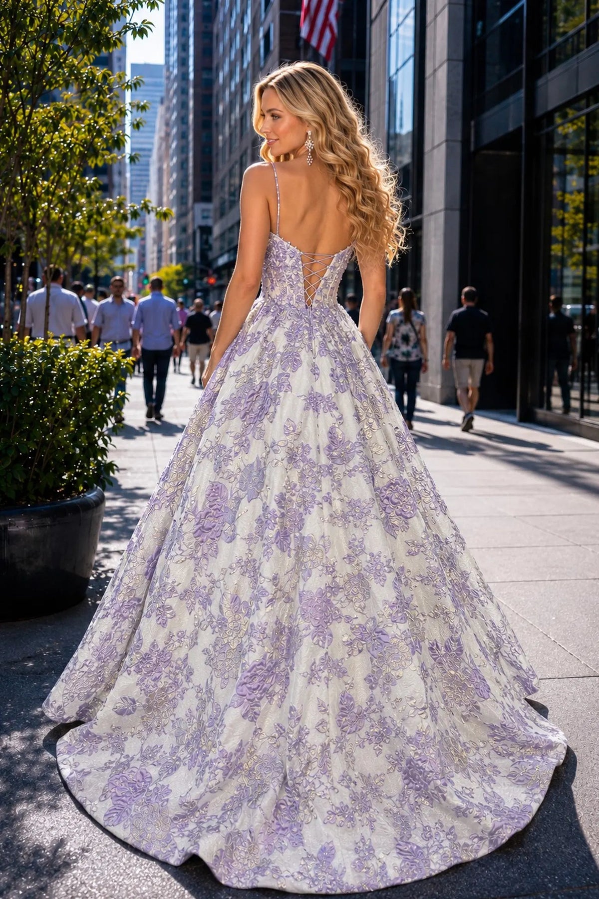 Back view of this Lilac prom and evening dress highlights the fitted back and flowing hem.