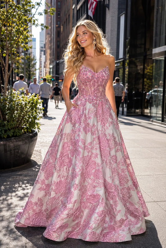 Pink prom and evening dress with a sweetheart neckline and floor-length skirt.