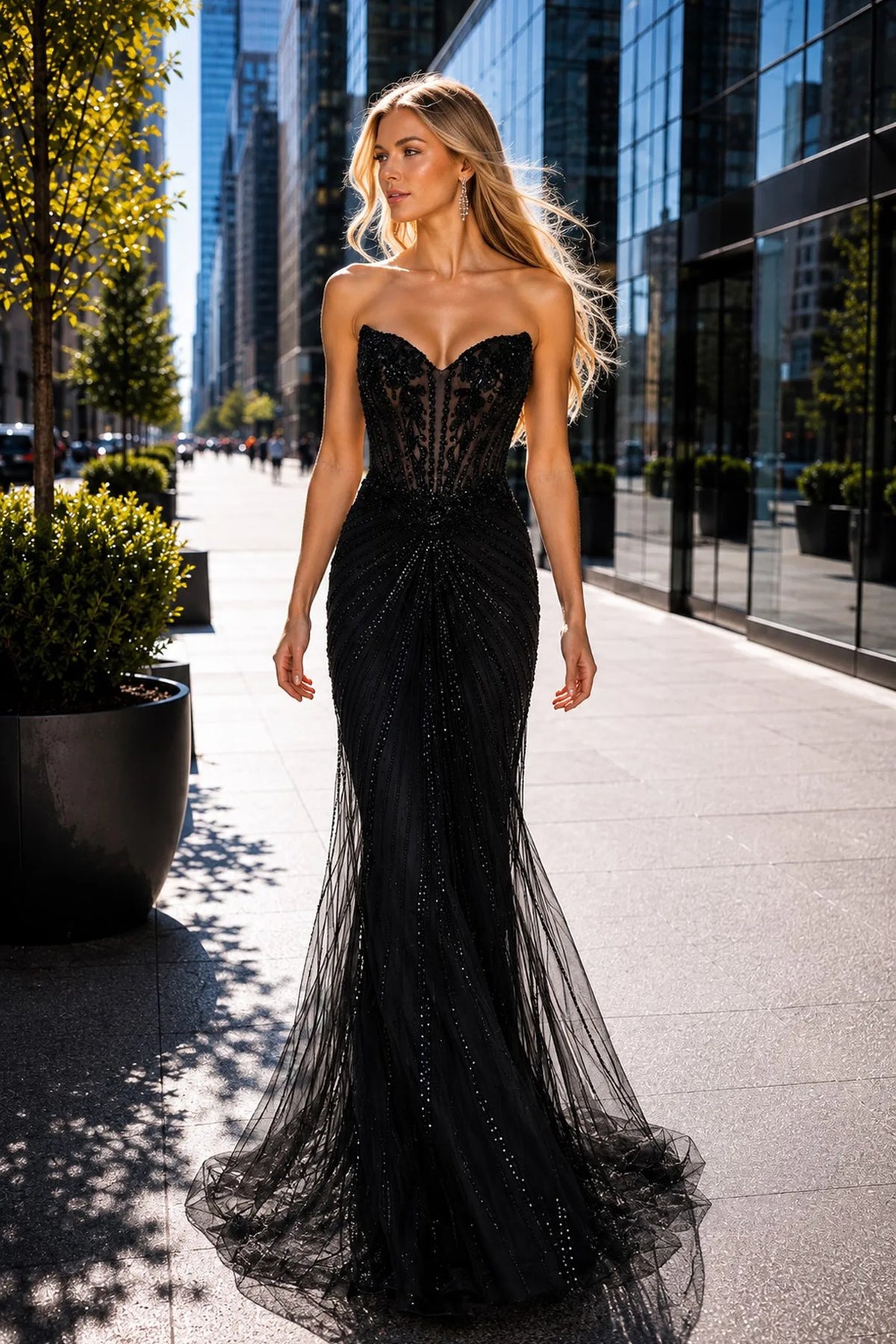 Black prom and evening dress with a sweetheart neckline and lace skirt.