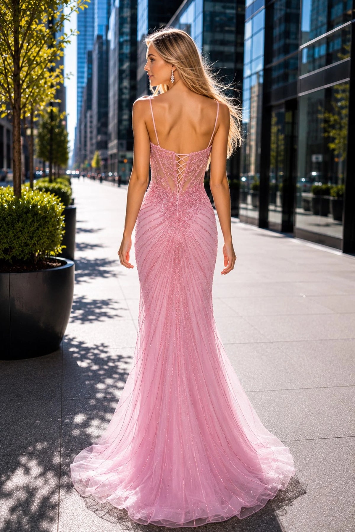 Back view of this Pink prom and evening dress highlights the lace-up back.