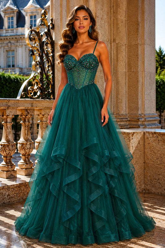 Shown in a front view, the Green prom and evening dress has beaded sweetheart bodice and tiered ruffle tulle skirt.