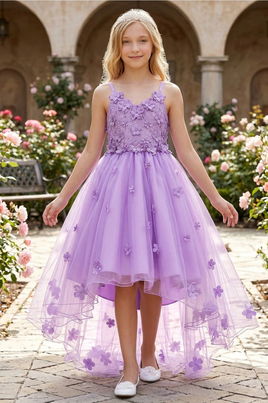 Shown in a front view, the Lilac flower girl dress has sleeveless floral bodice and floral-edged high-low tulle skirt.