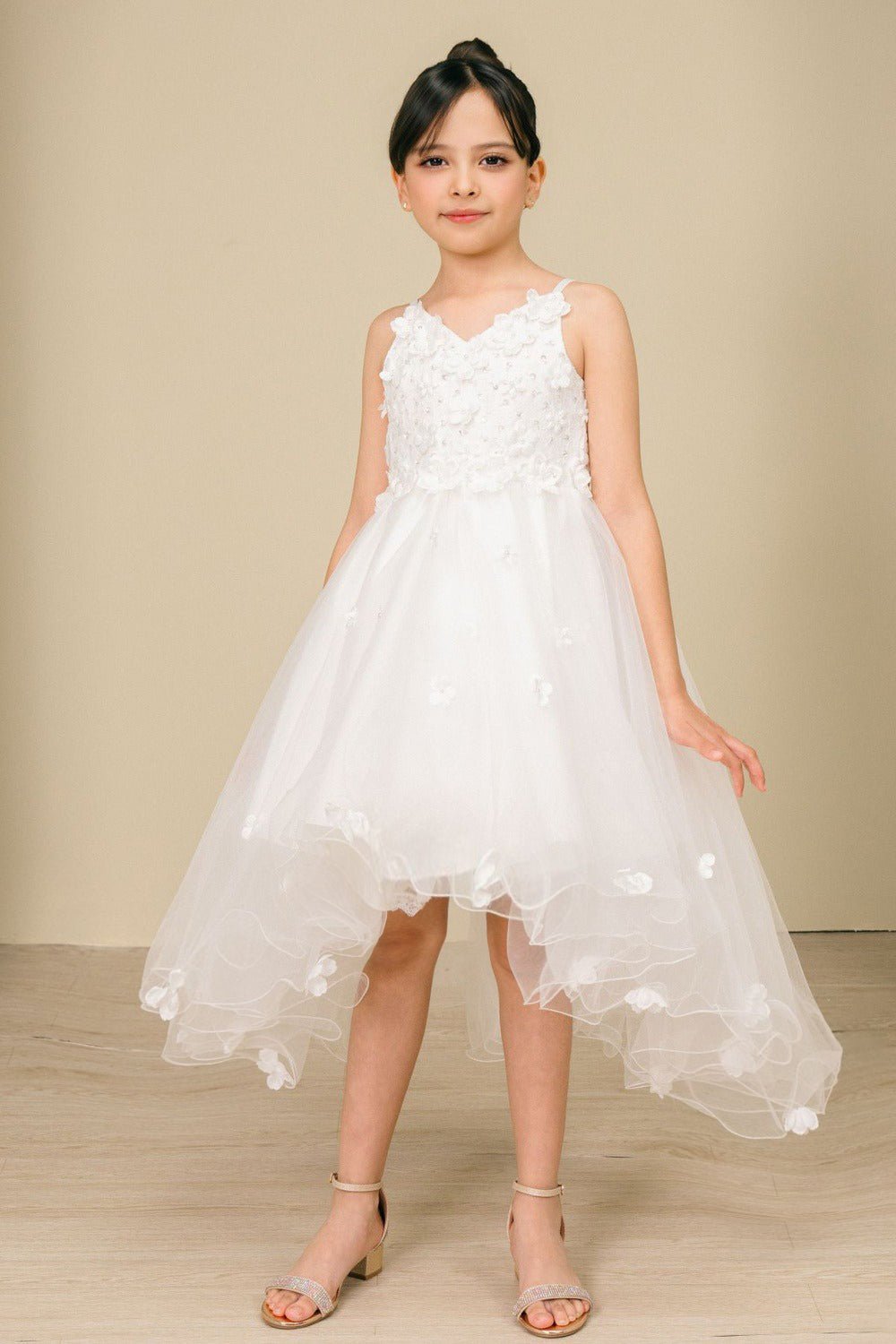 Front view of sky blue high-low tulle flower girl dress with 3D floral appliqué bodice and layered high-low skirt.