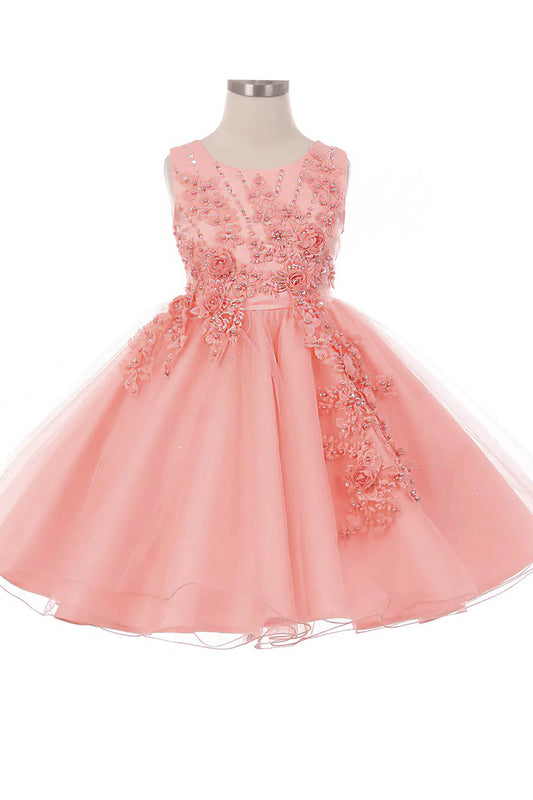Front-facing in peach blush glitter tulle flower girl dress with 3D pearl-beaded floral appliqué bodice and layered skirt