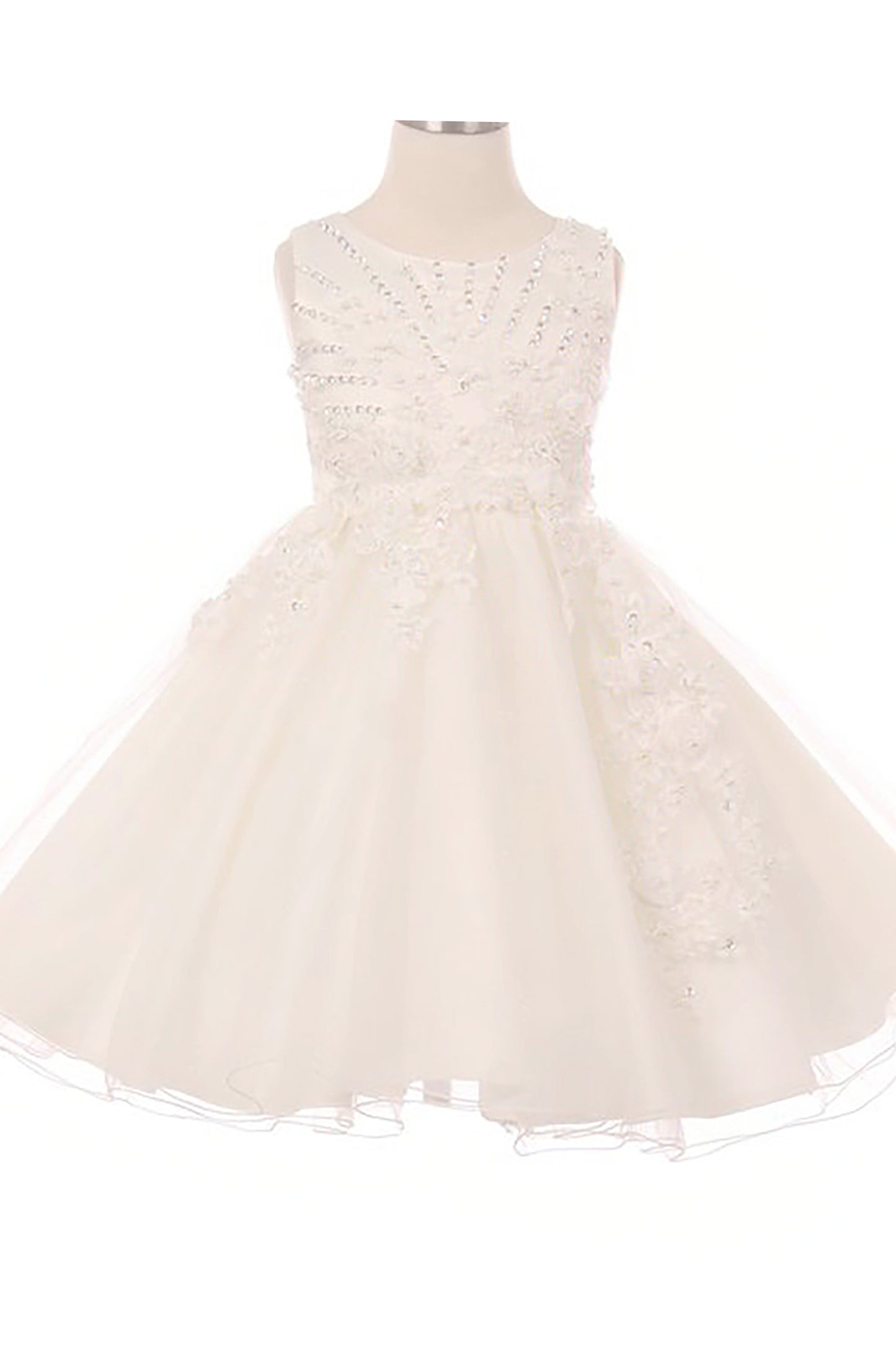 Young girl standing front-facing in ivory glitter tulle flower girl dress with 3D pearl-beaded floral appliqué bodice and layered skirt