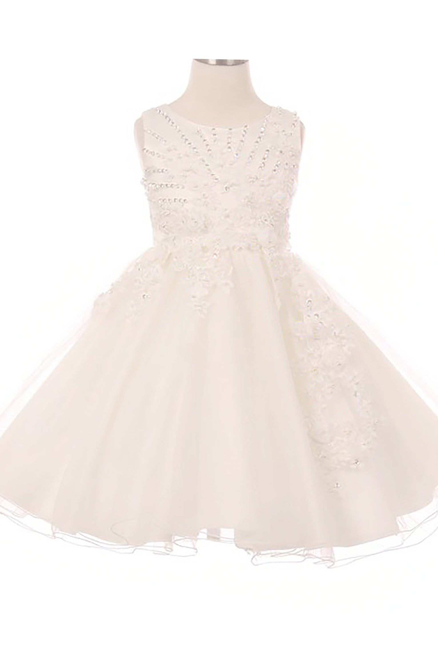 Young girl standing front-facing in ivory glitter tulle flower girl dress with 3D pearl-beaded floral appliqué bodice and layered skirt