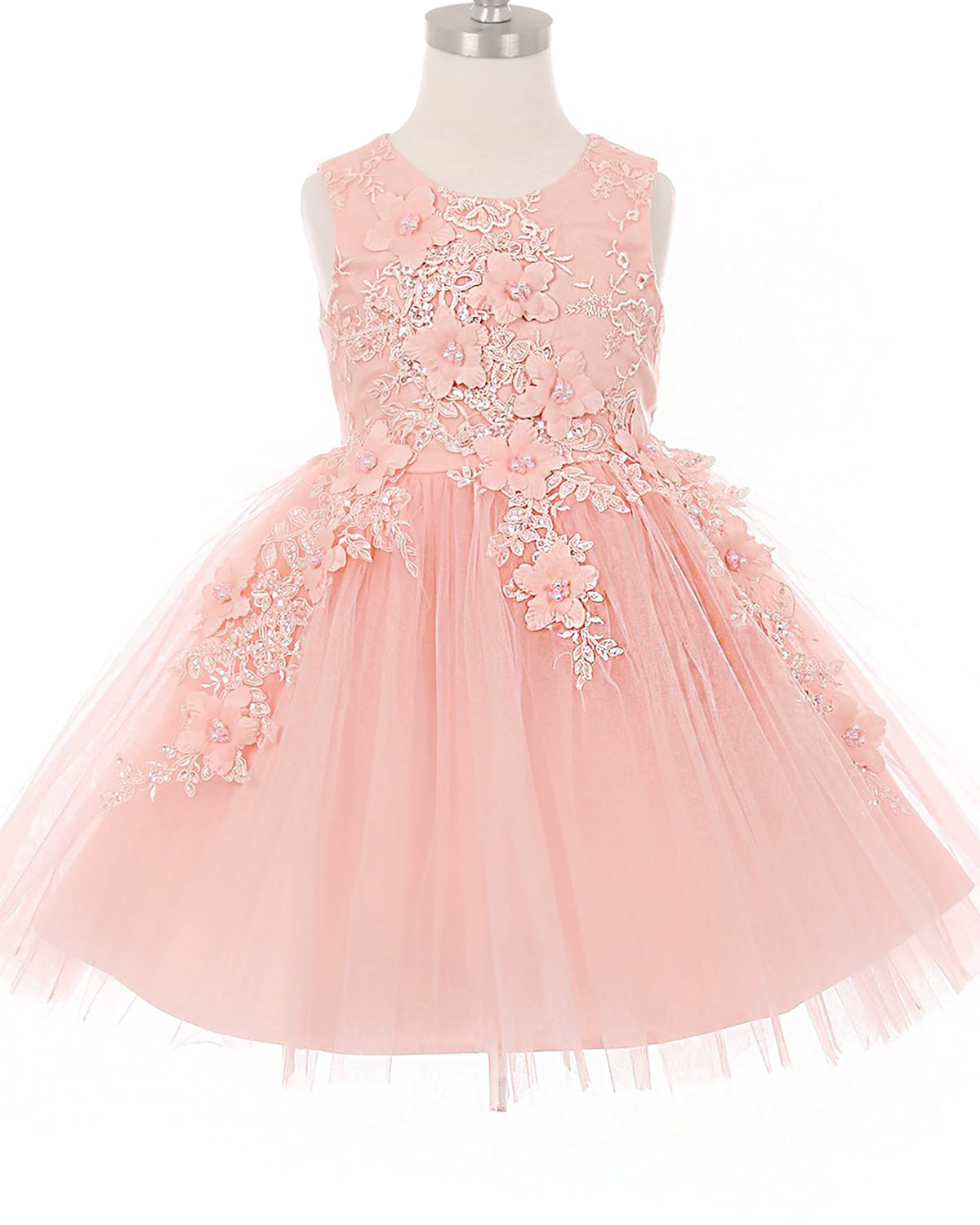 Blush flower girl dress with floral lace details.