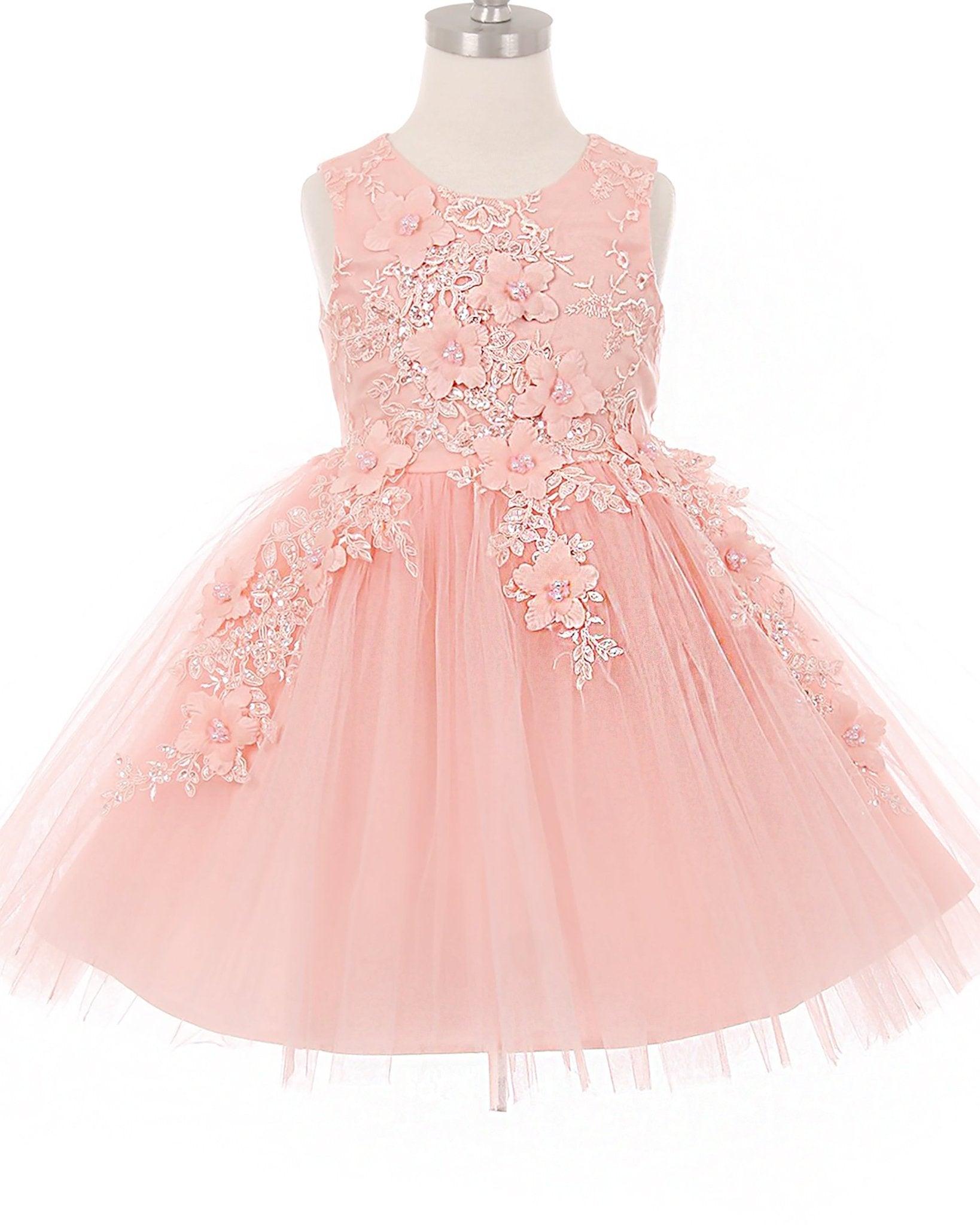 Blush flower girl dress with floral lace details.