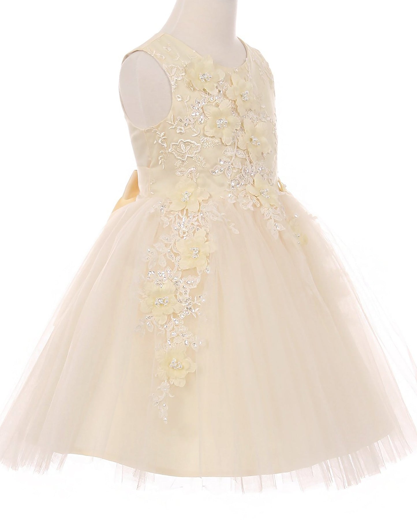 Champagne flower girl dress with floral lace details.