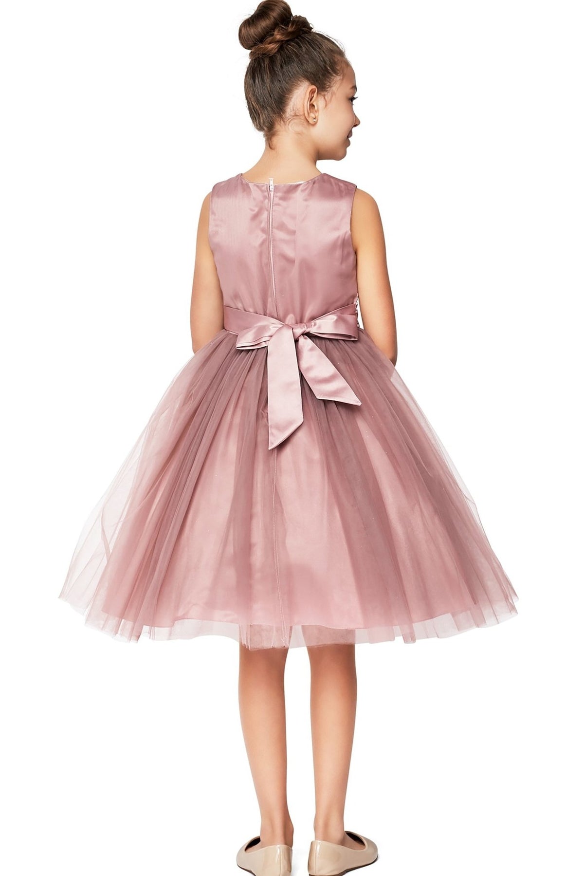 A Mauve with a bow. Flower girl dress.