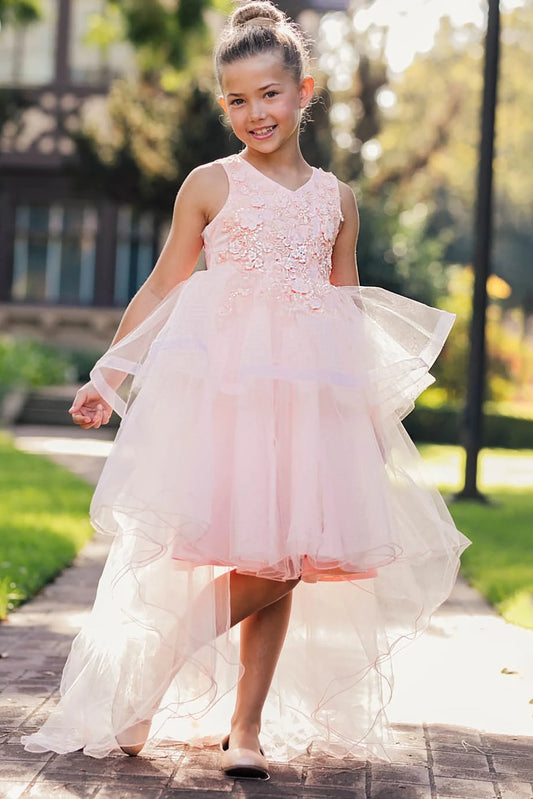 A peach blush floral flower girl dress.