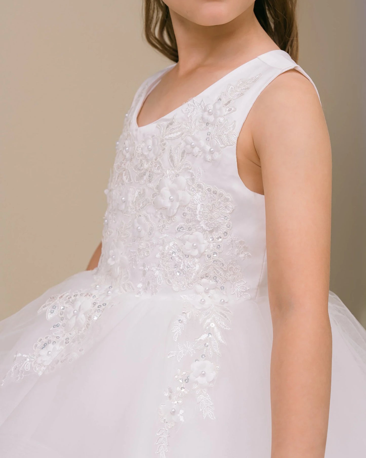 Front view of White 9 layers of Skirt Train with Elegant Hand-crafted Sequin Pearl Beads Top flower girl dress.