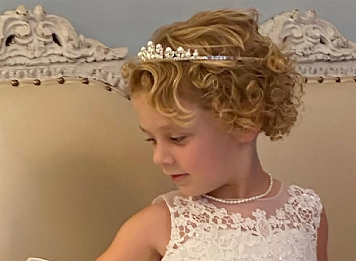 Silver pearl rhinestone flower girl and mini quince tiara, side view.