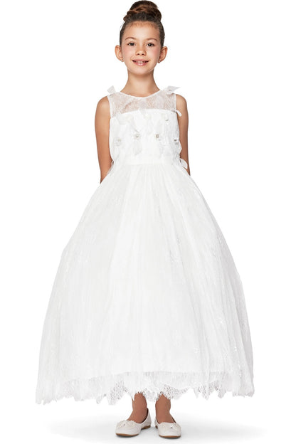 Ivory flower girl dress features sheer yoke with large flowers above a textured skirt.