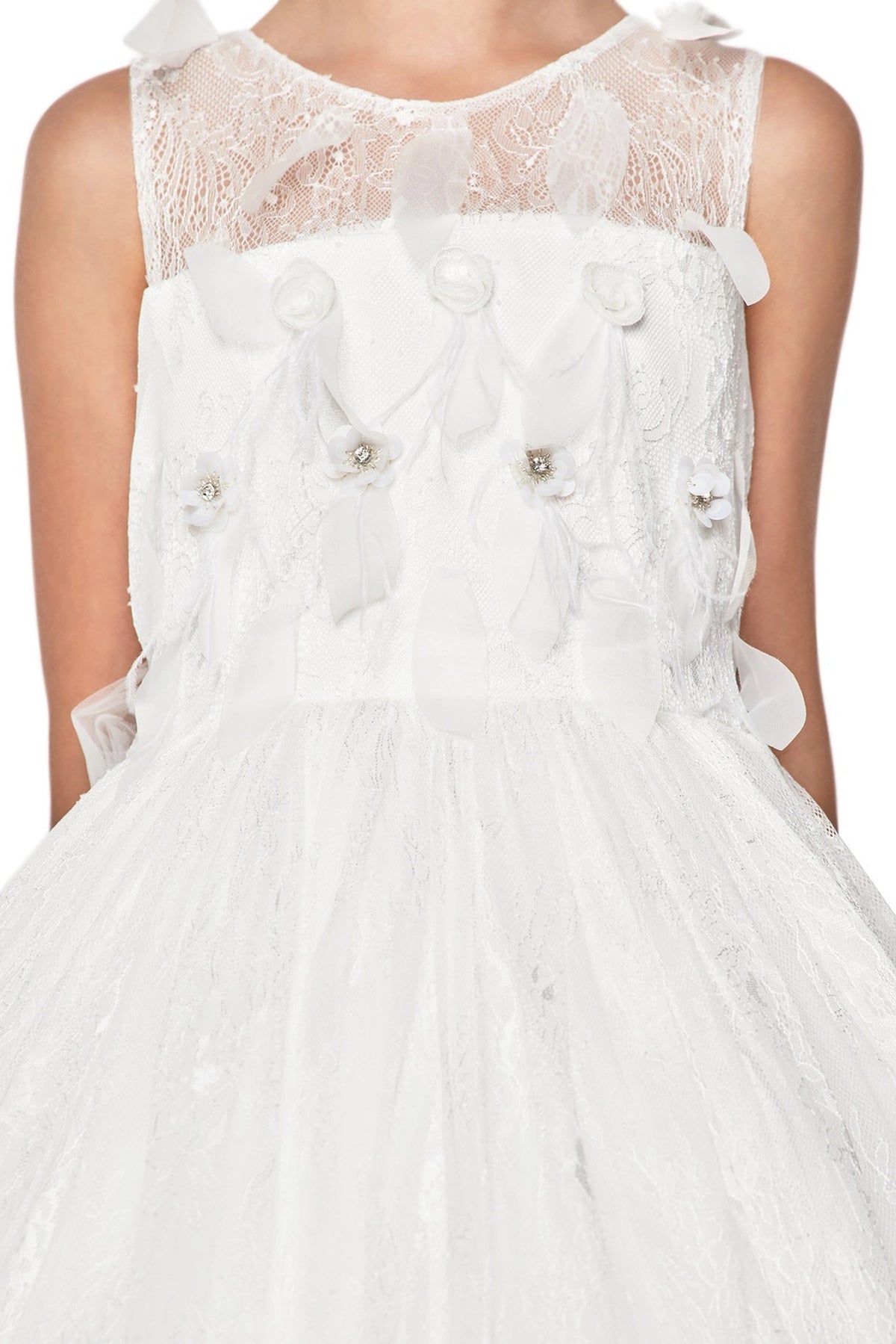 Visible on this Ivory flower girl dress: large fabric flowers and small crystal-like accents.