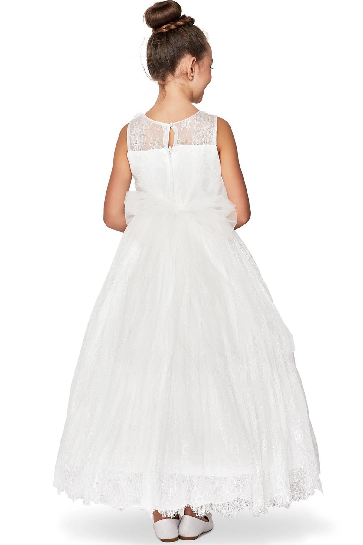 A Ivory flower girl dress showing back satin bow with zipper and sheer yoke.
