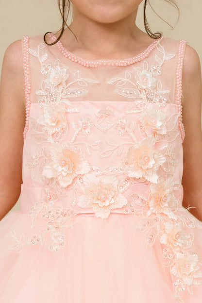Visible on this Peach flower girl dress: flower appliques across the embroidered bodice.
