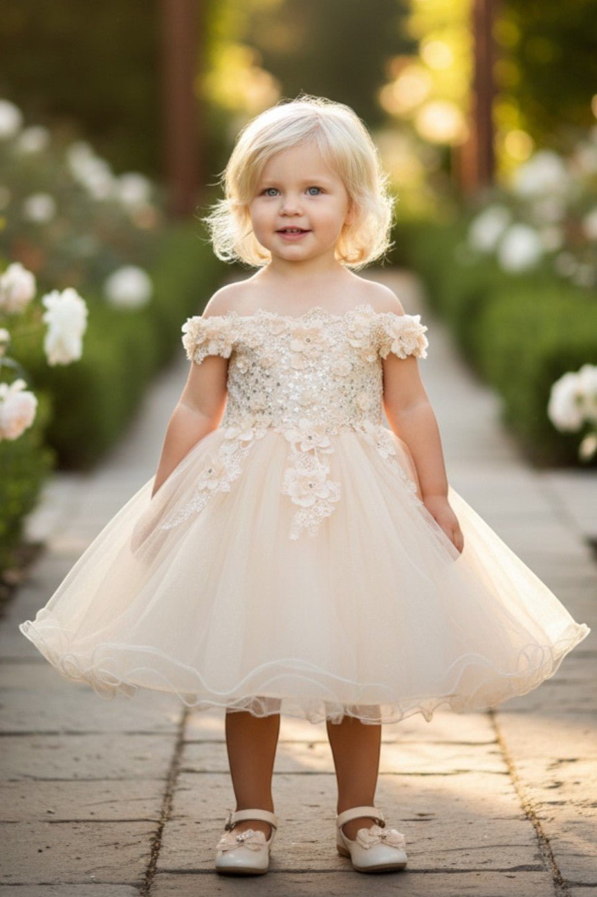 Champagne flower girl Dress Front View With Off Shoulder Bodice And Layered Tulle Skirt.
