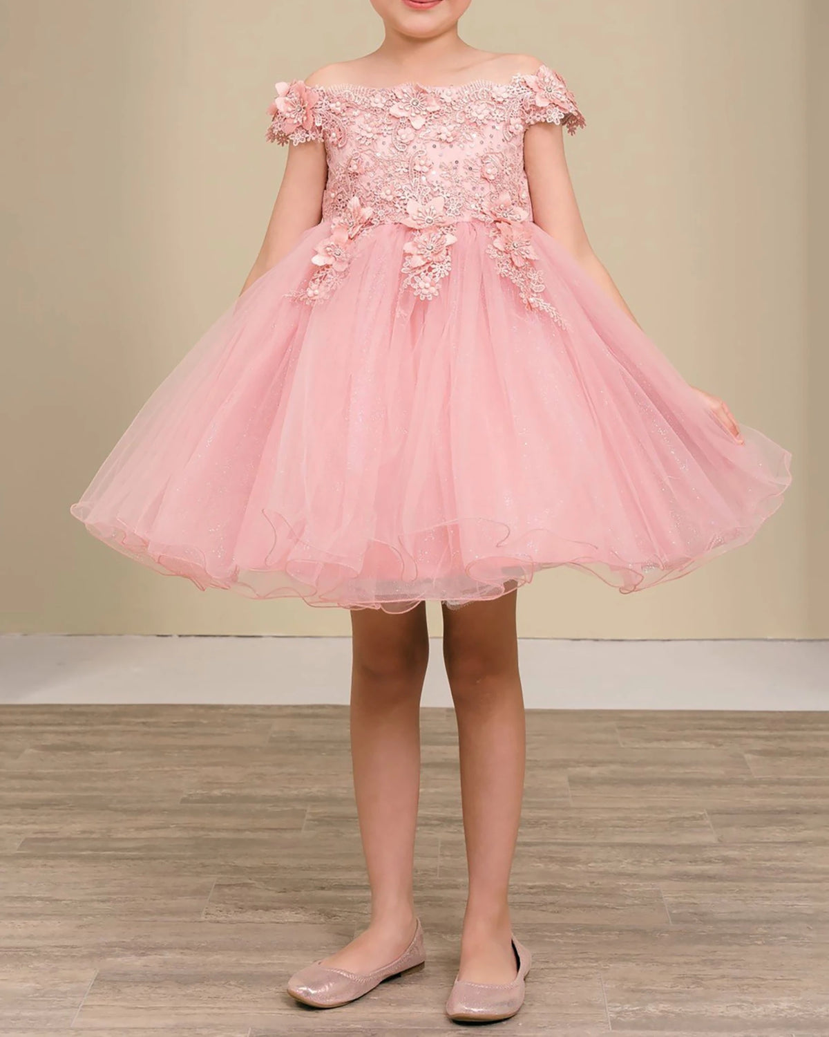 Dusty rose off-shoulder flower girl dress with floral details.