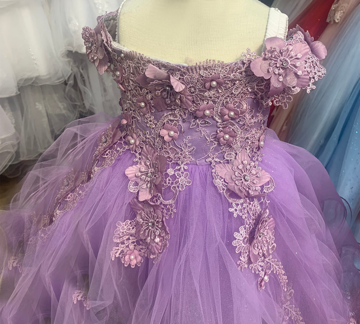 Front view of Lilac Off-Shoulder Flower Girl Tulle flower girl dress with Floral Applique, Pearls and Glitter Skirt.