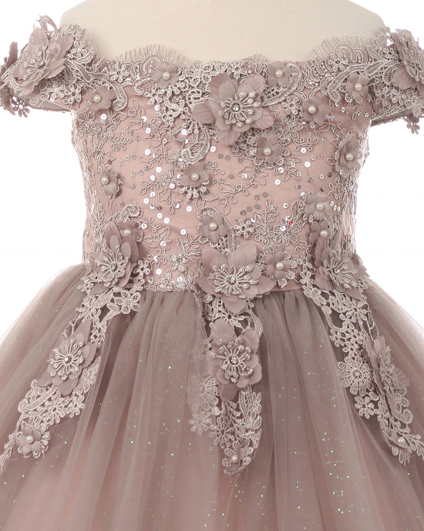 Mauve off-shoulder flower girl dress with floral and lace details.