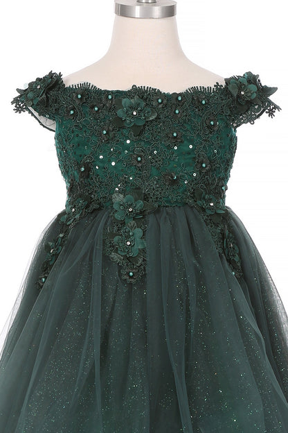 Close-up front view of hunter green dress showing floral applique and pearl detail