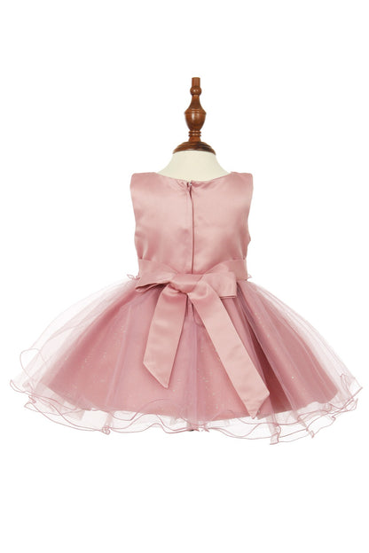 Rose dress back view highlighting flowing tulle skirt and elegant silhouette