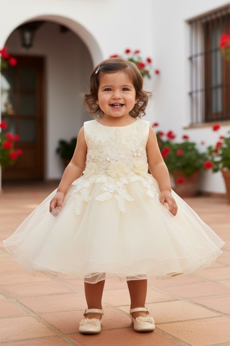 Champagne flower girl Dress Front View With Lace Bodice And Layered Tulle Skirt.