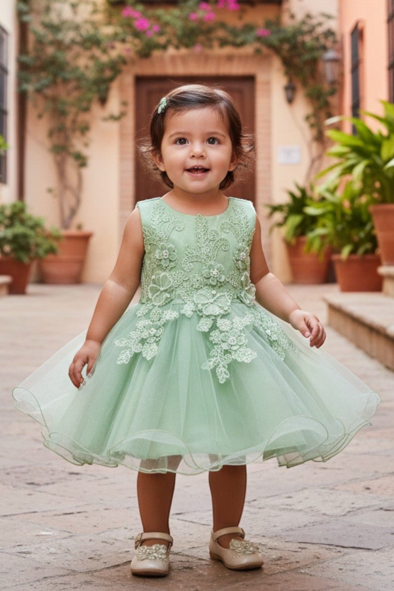Sage flower girl Dress Front View With Cap Sleeves And Layered Tulle Skirt.