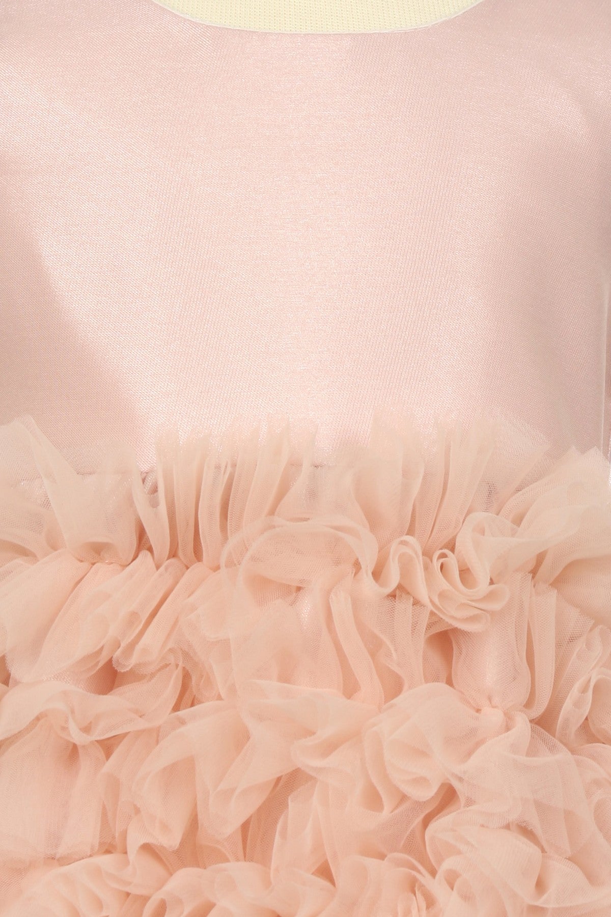 Close-up front view of dusty rose flower girl dress showing bodice detail and soft tulle texture.