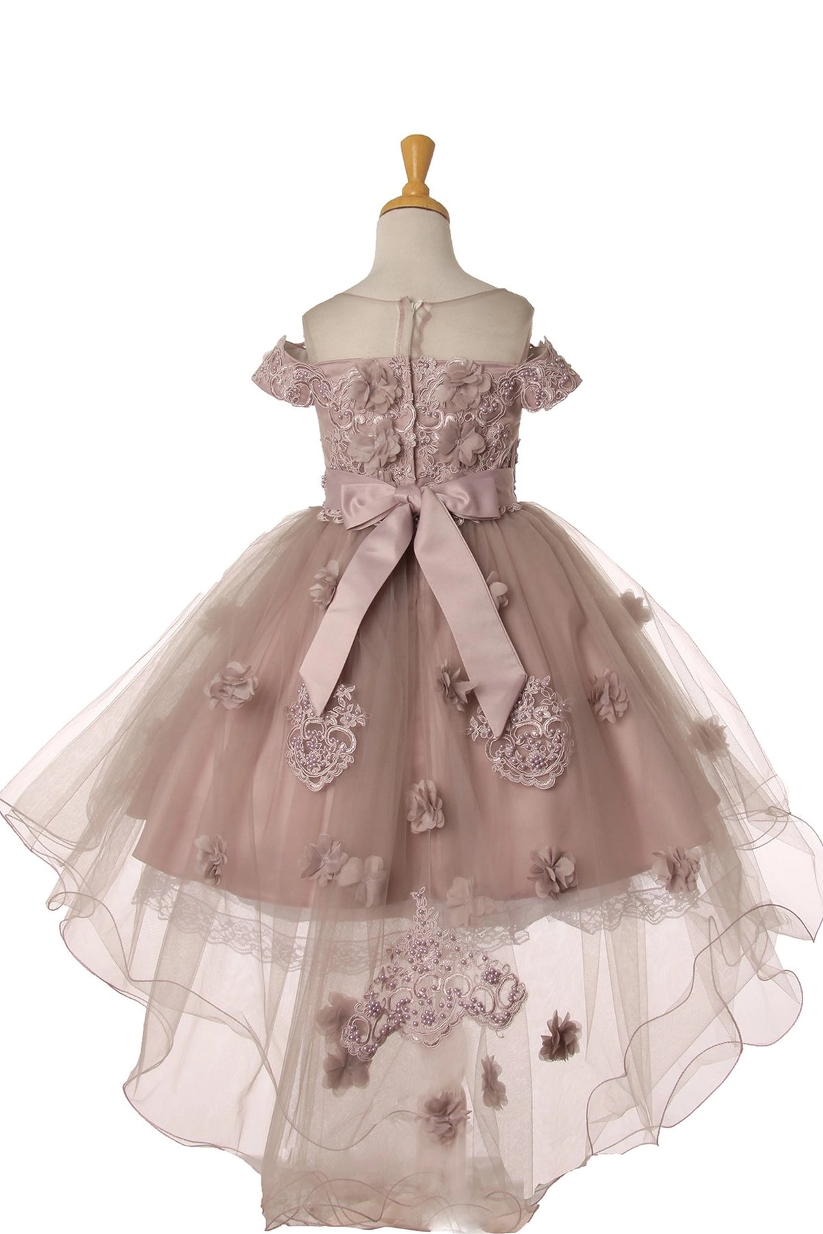 Showcasing with dimensional flowers across the bodice, this Mauve kids party dress displays elegant detail.