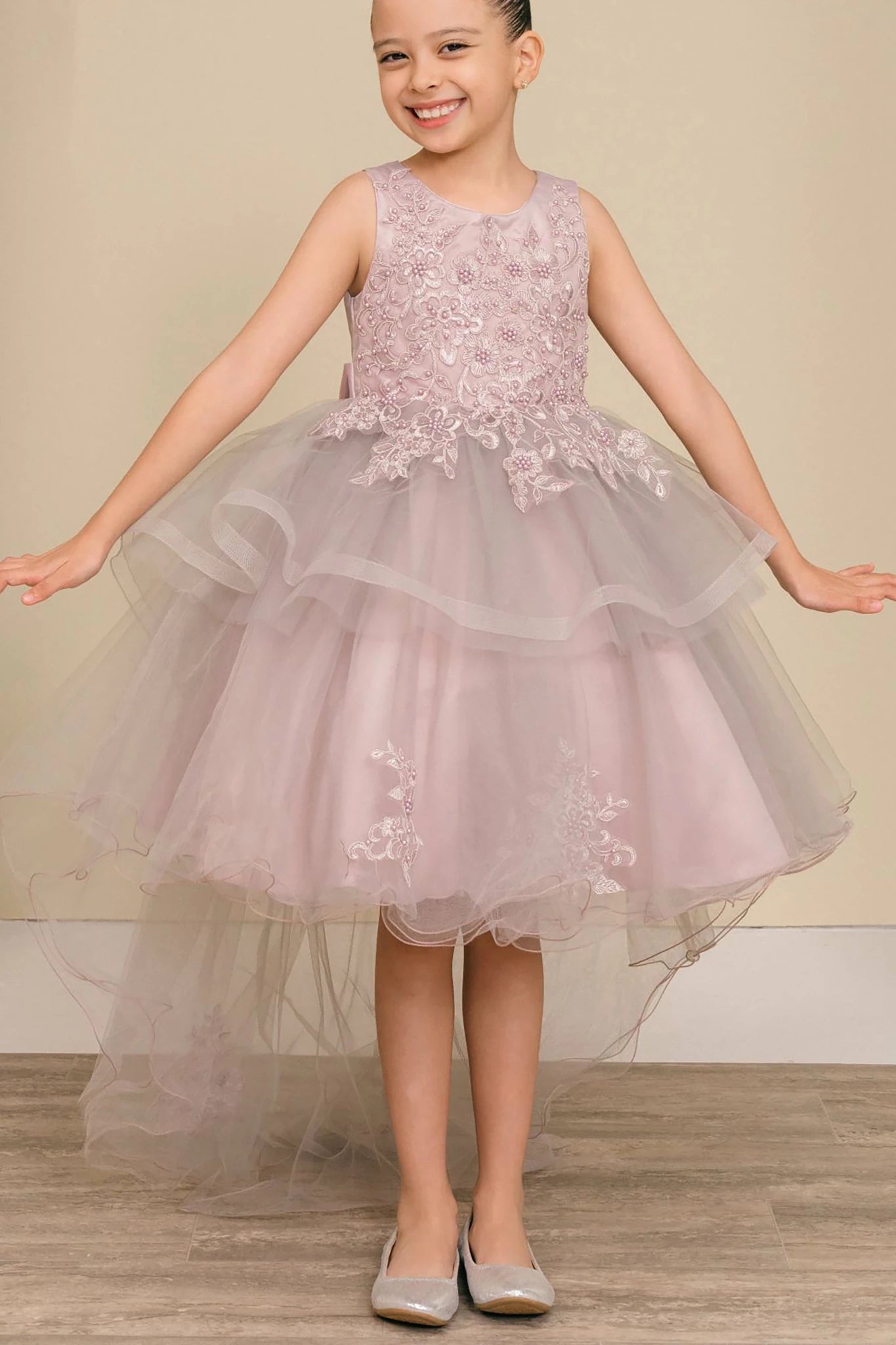 A Mauve floral flower girl dress.