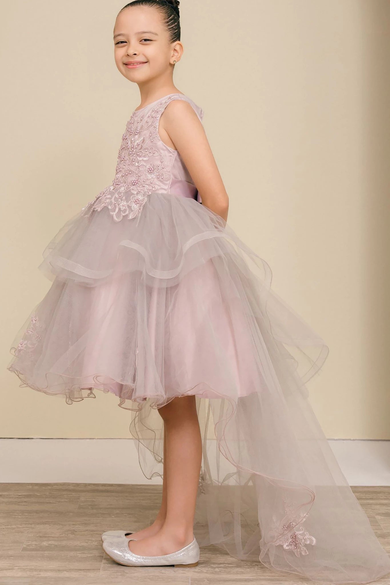 A Mauve floral flower girl dress.