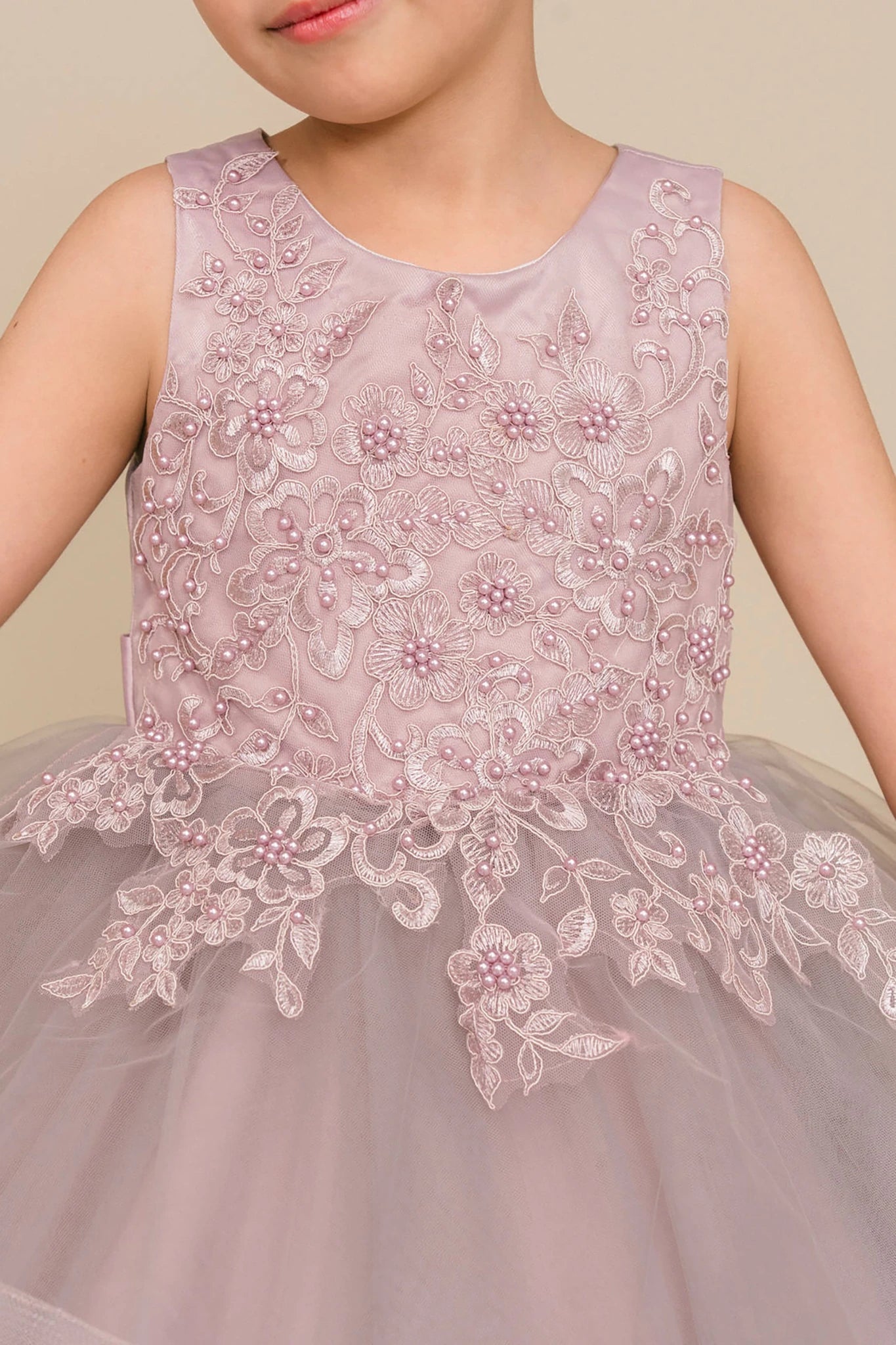 Children's Mauve flower girl dress with floral embroidery.