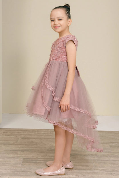 Featuring lace-trimmed tiers and longer back hem on the Mauve flower girl dress.