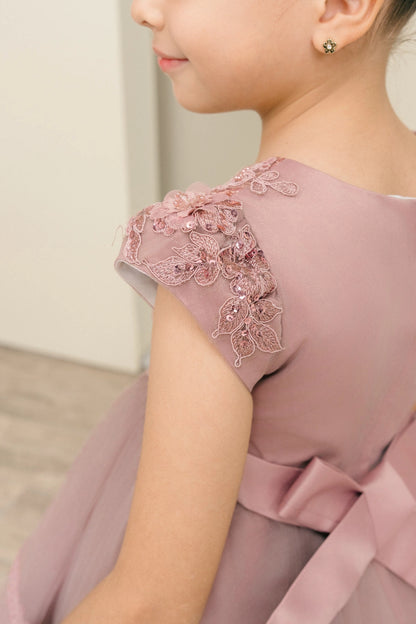 Notice the lace cap sleeve beside the satin back on this Mauve flower girl dress.