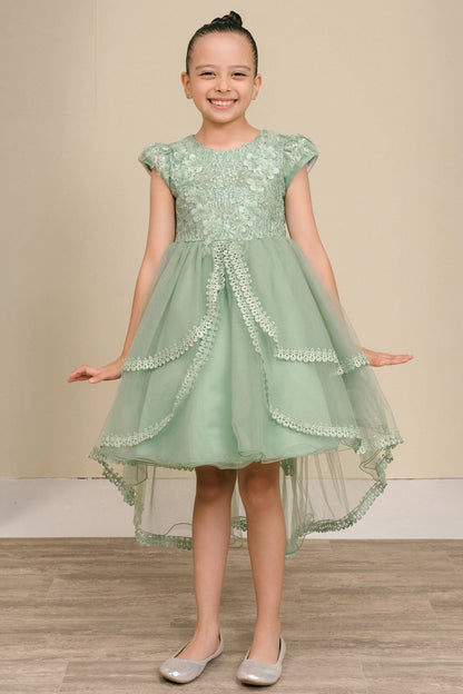 Sage flower girl dress features lace bodice and asymmetric layered skirt.