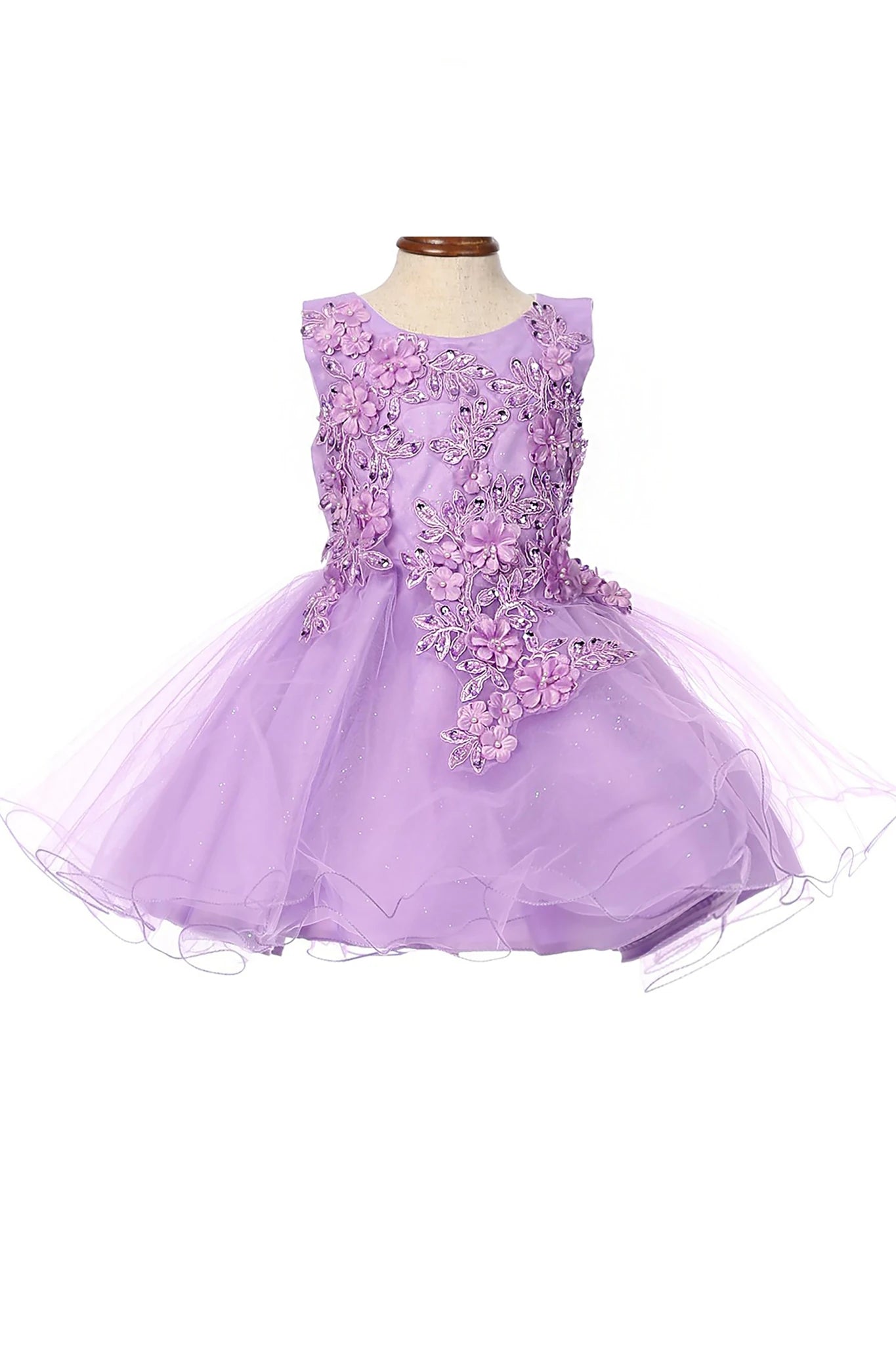 Lilac flower girl dress with floral embellishments.