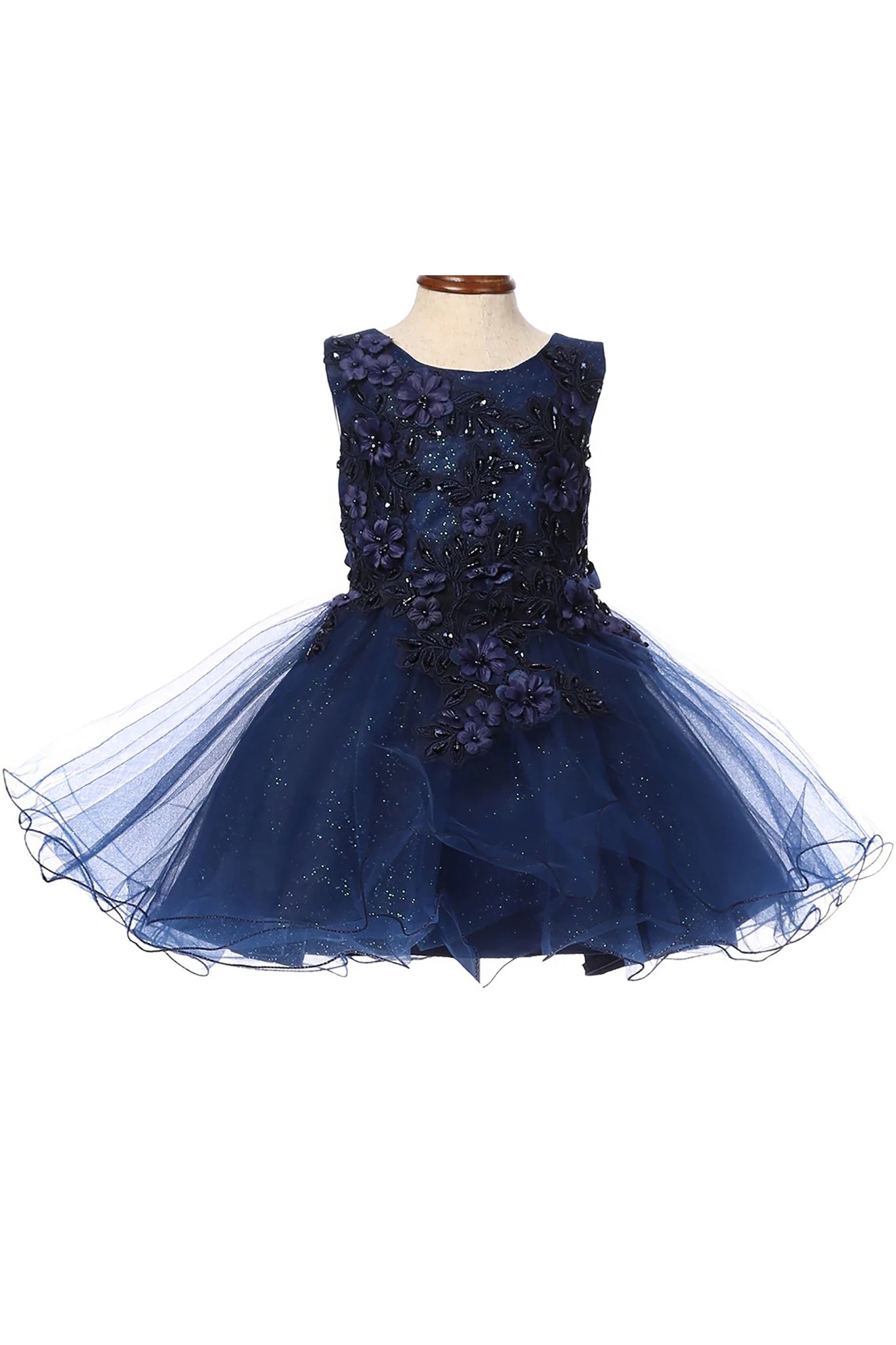 Navy blue flower girl dress with floral embellishments.