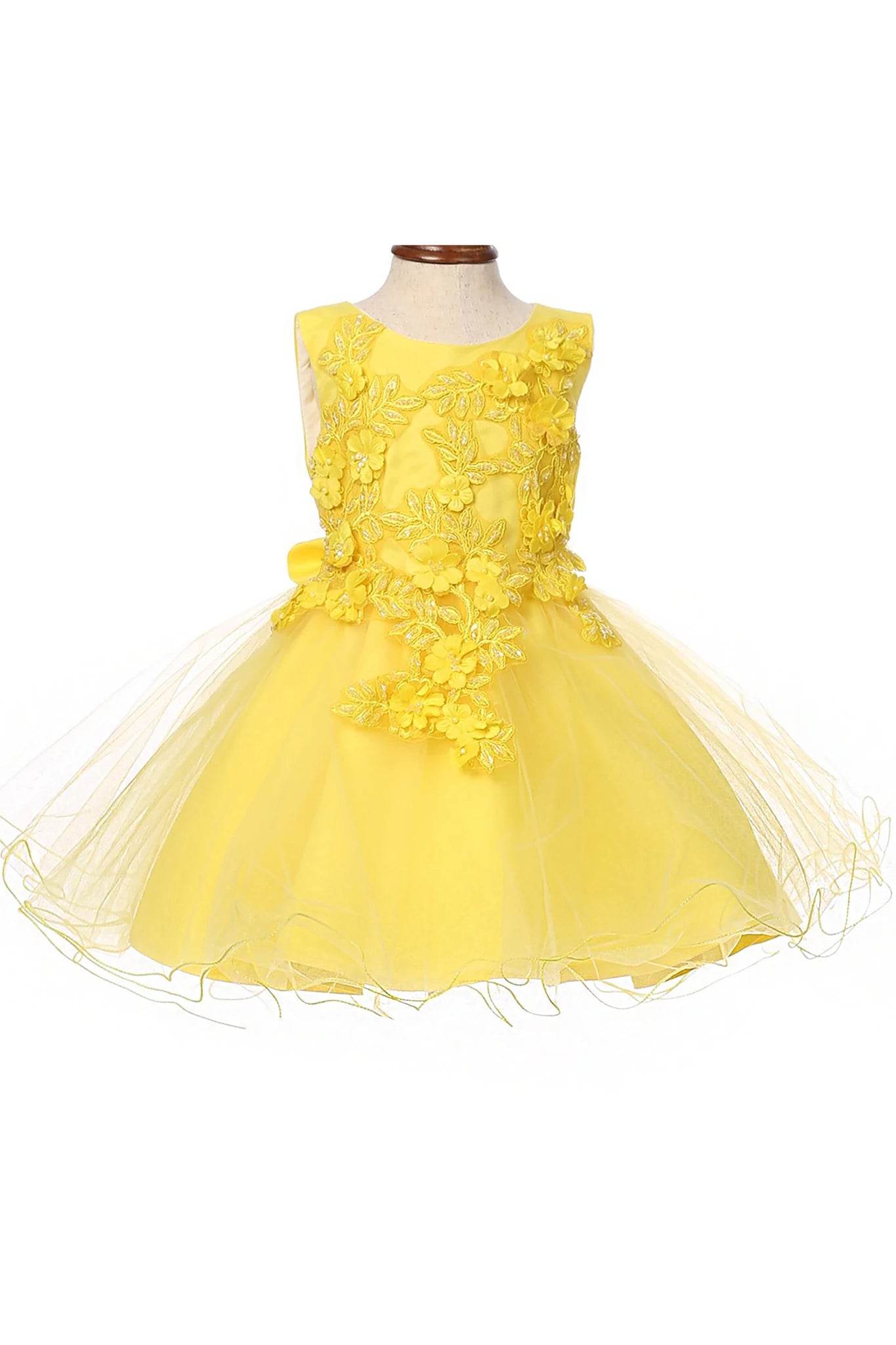 Yellow flower girl dress with floral details.