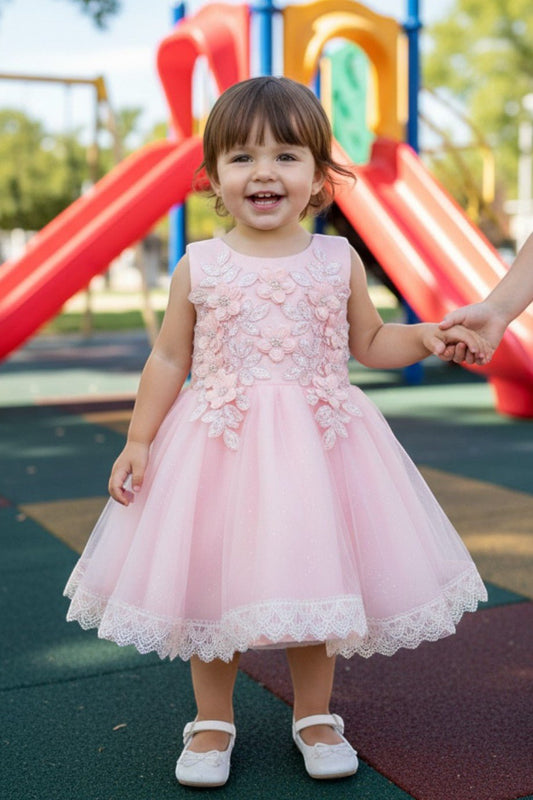 Kid Wearing Blush Flower Girl Dress Front View With Embroidered Bodice And Layered Tulle Skirt