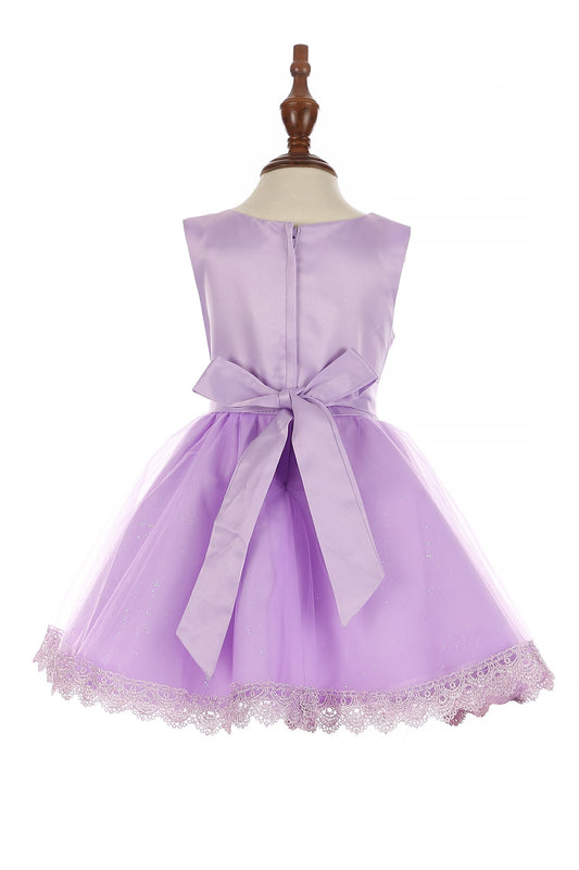 Lilac dress back view highlighting voluminous tulle skirt and elegant silhouette