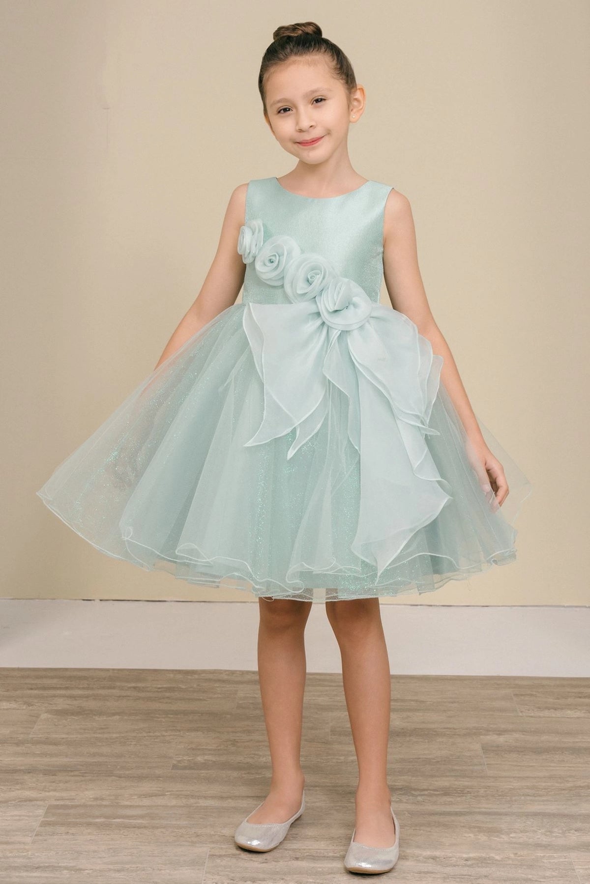 Sage flower girl dress features floral waist and flared layered skirt.