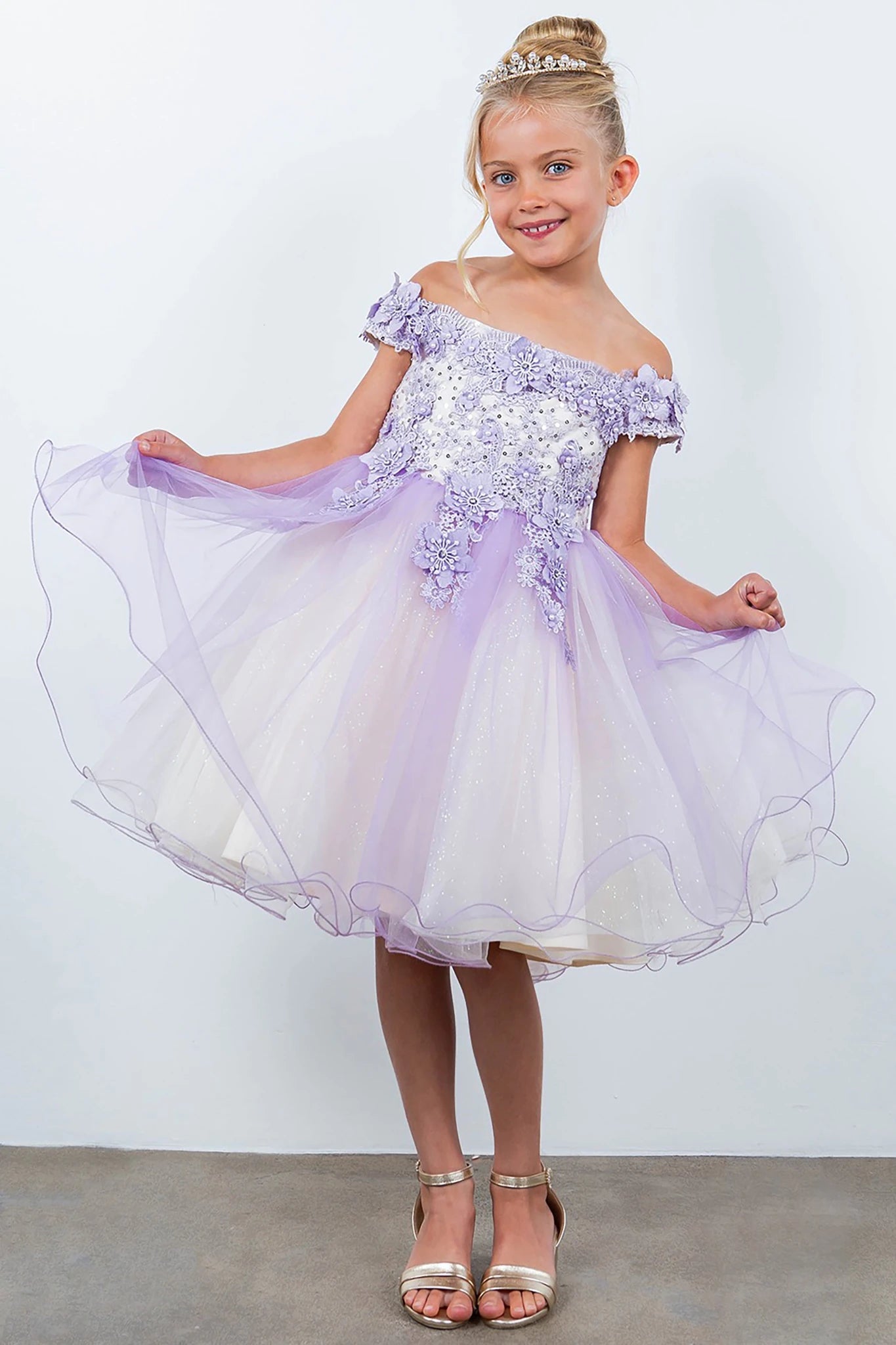 A lilac flower girl dress with sequin details.