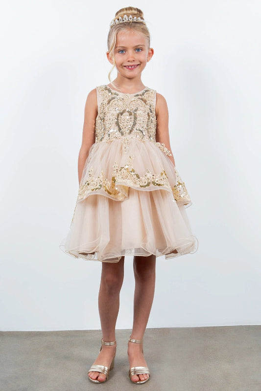 Shown in a front view, the Champagne flower girl dress has beaded sleeveless bodice and layered skirt with scalloped lace trim.