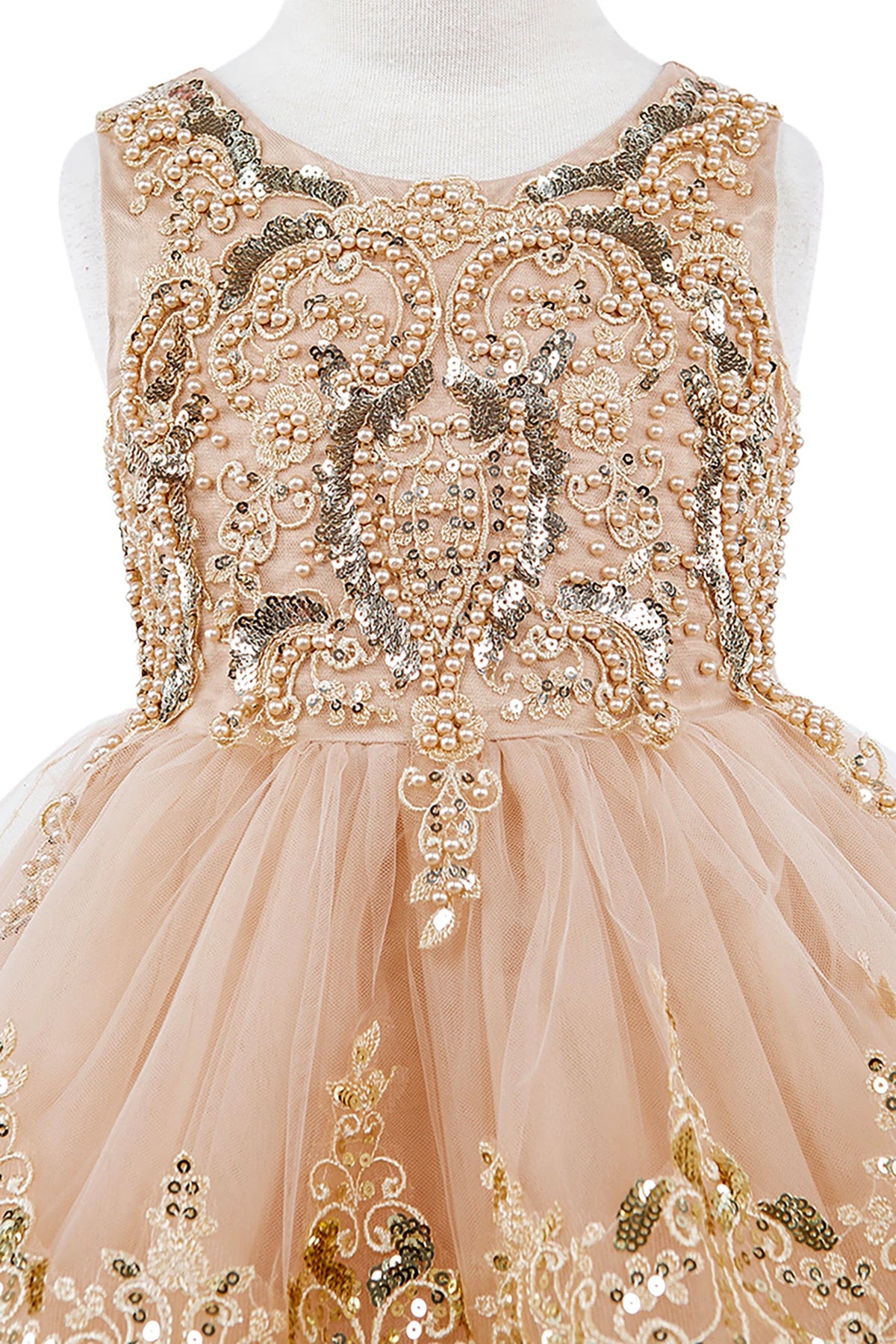 Champagne flower girl dress with gold embroidery and sequins.