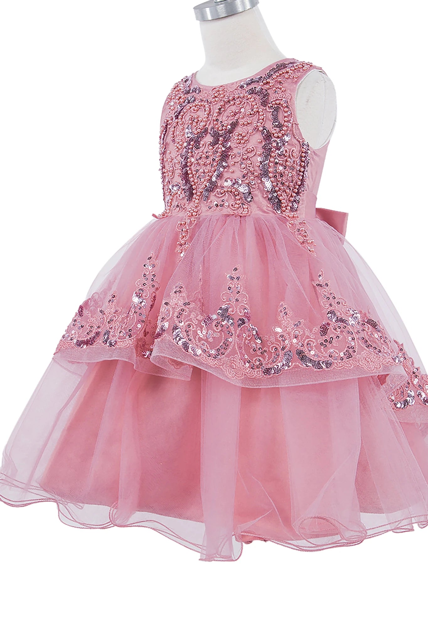 Pink flower girl dress with sequin details.