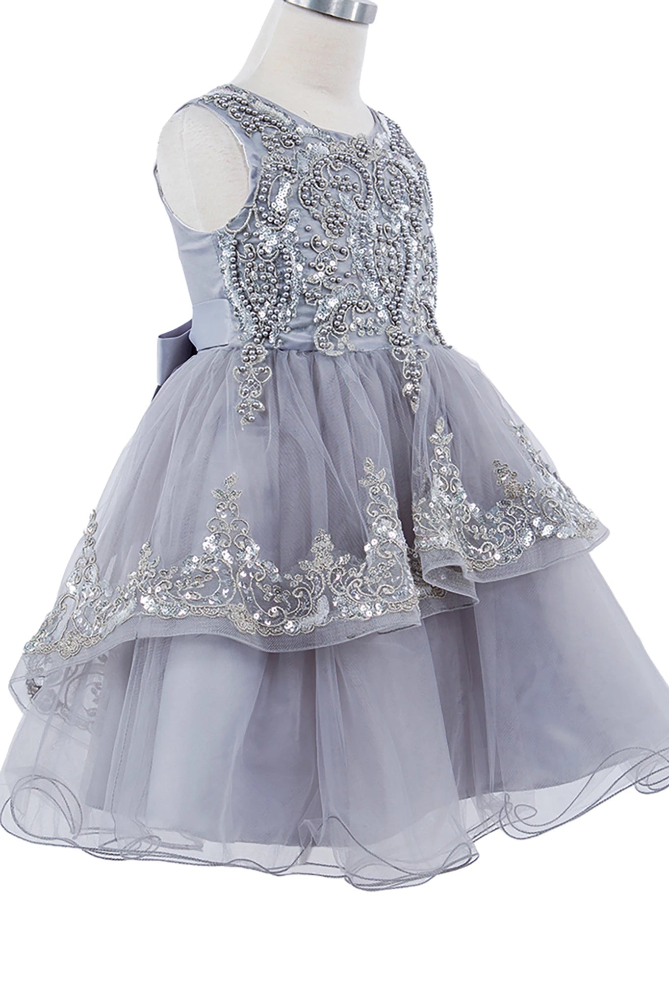 Gray flower girl dress with silver embellishments.