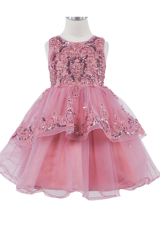 Pink sequin dress on a mannequin against a white background