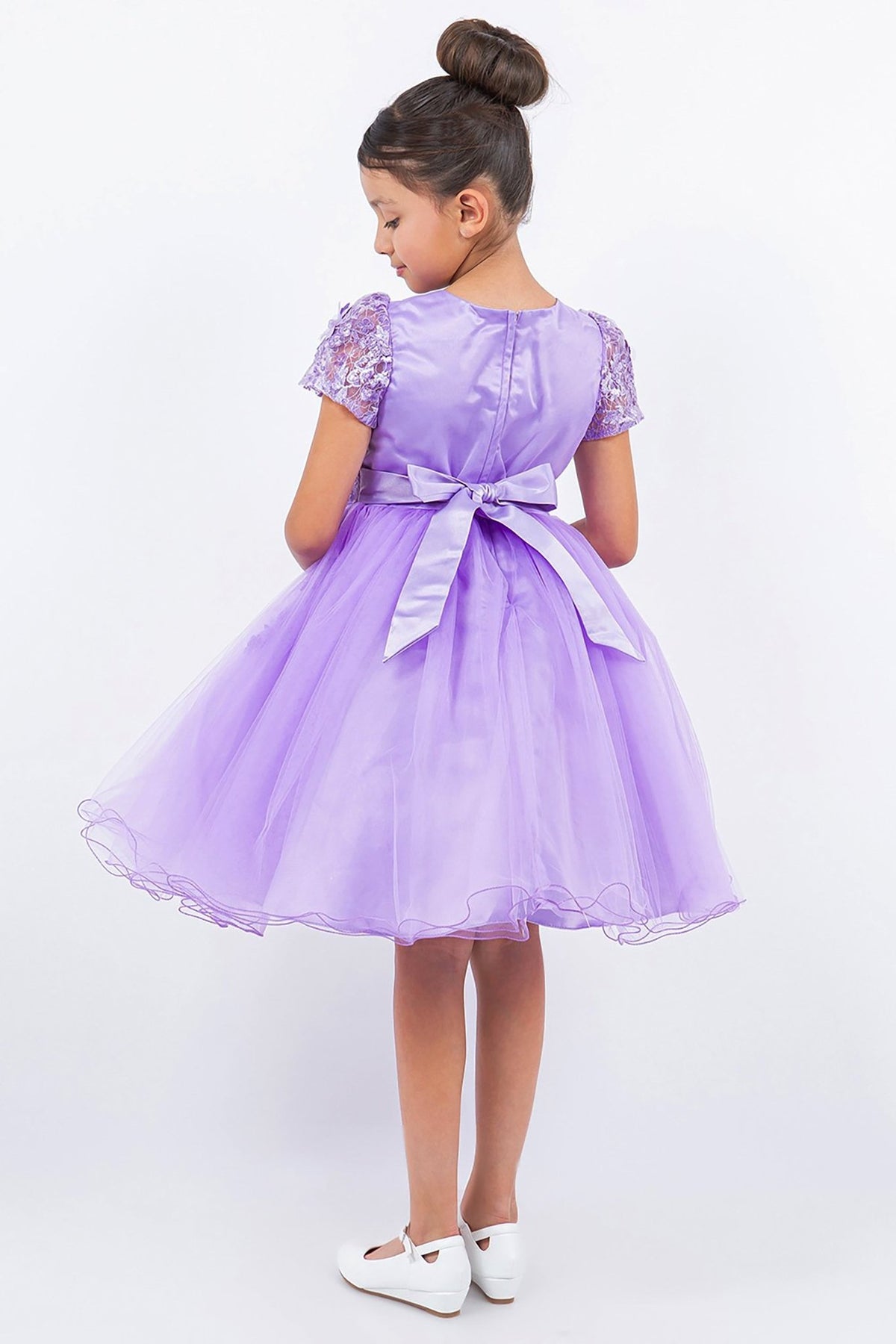 Rear view reveals lilac Embedded 3D Floral Cap Sleeve flower girl dress with Wired Tulle.